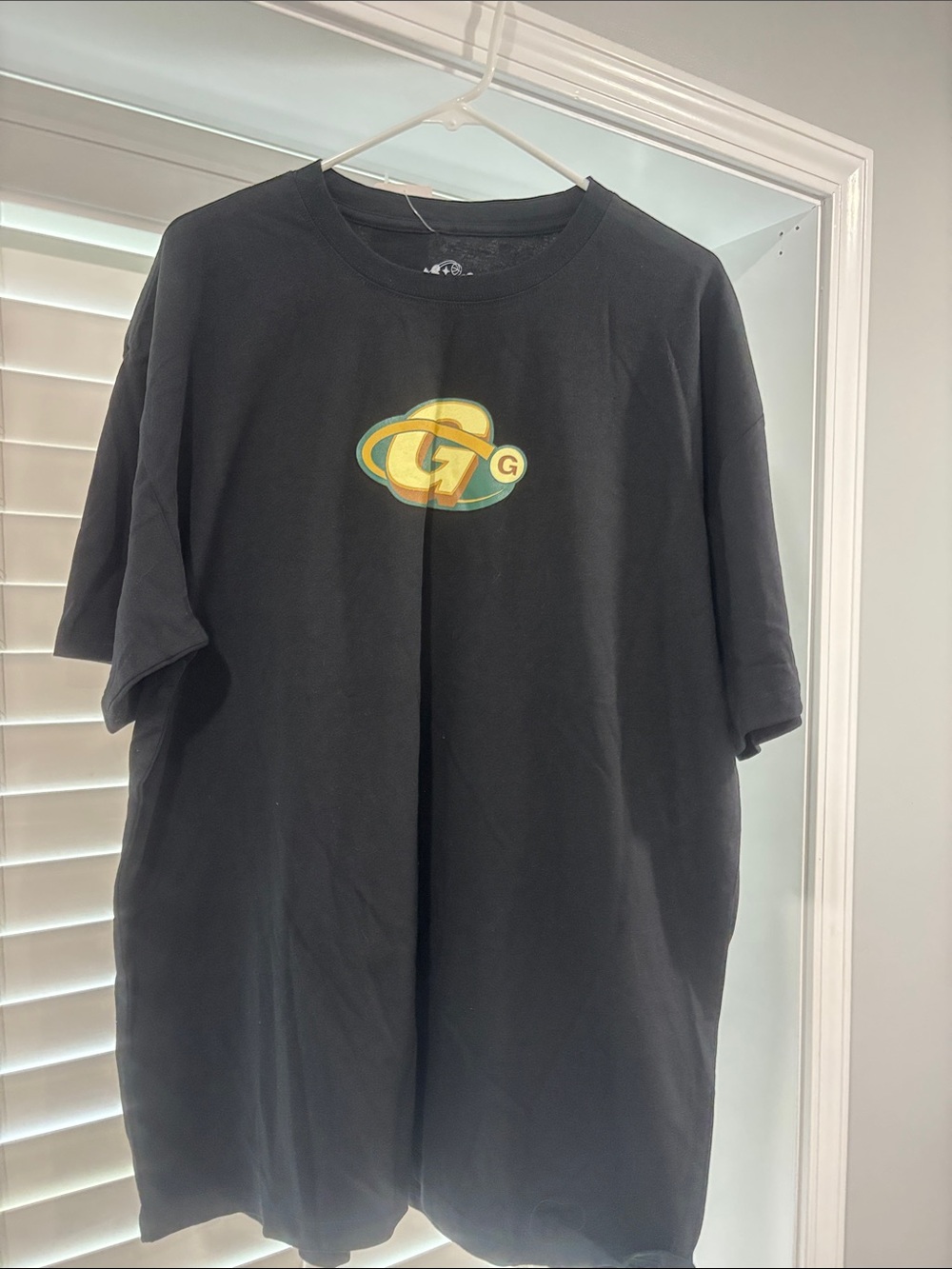Men's Black Short-Sleeve Tee with Yellow & Green Chest Logo